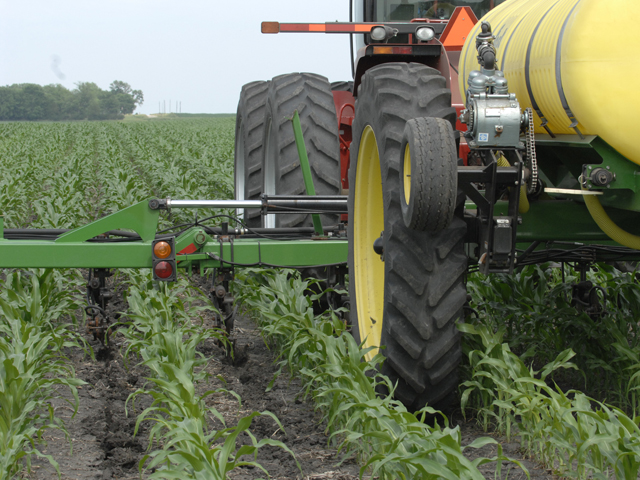 Check labels carefully for herbicide-insecticide interactions when treating young corn fields for weeds and insects this spring. (DTN photo by Bob Elbert)